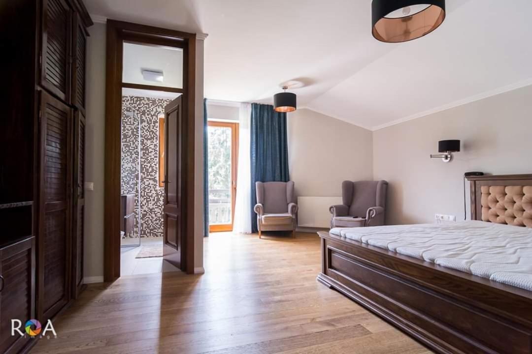 Pensiunea Izvorul Zanelor Colibita Bagian luar foto
